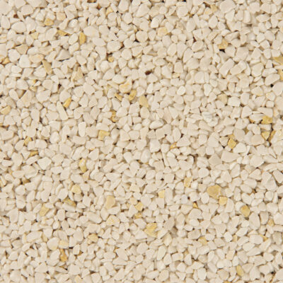 Nahaufnahme eines beige Steinteppichs mit 2-4 mm Körnung