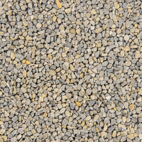 Nahaufnahme von kleinen, gemischten Steinen in Beige, Grau und Gelb