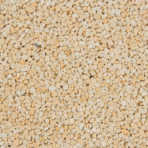 Nahaufnahme eines beigefarbenen Steinteppichs mit feiner Körnung