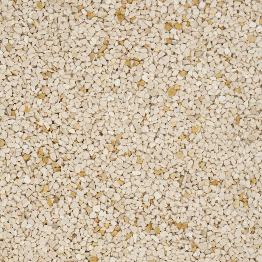 Nahaufnahme von beige-gelben Marmorkieseln in gleichmäßiger Anordnung