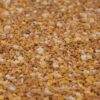 Nahaufnahme eines beige-gelben Steinteppichs mit 2-4 mm Marmorkies