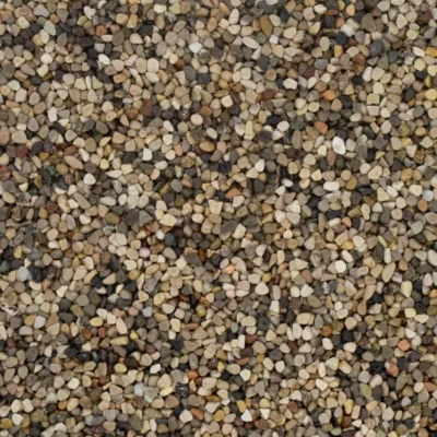 Nahaufnahme eines bunten Steinteppichs mit 4-7 mm Marmorkies in verschiedenen Beige- und Brauntönen