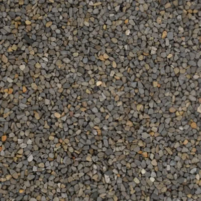 Nahaufnahme eines Steinteppichs mit beige-grauen Marmorkieseln in 4-7 mm Körnung