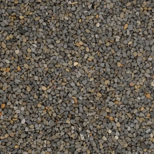 Nahaufnahme eines Steinteppichs mit beige-grauen Marmorkieseln in 4-7 mm Körnung
