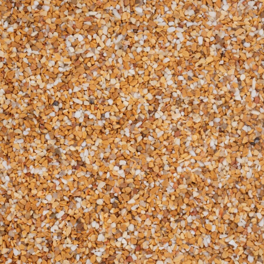 Nahaufnahme von gelben und weißen Marmorkieseln, gleichmäßig verteilt