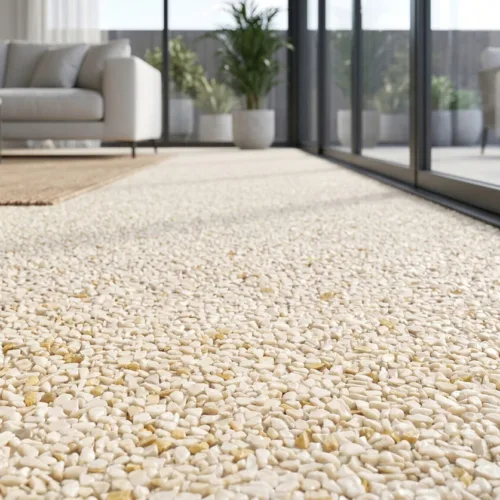 Heller Natursteinboden in einem modernen Wohnzimmer mit Glasfront, Sofa und Pflanzen
